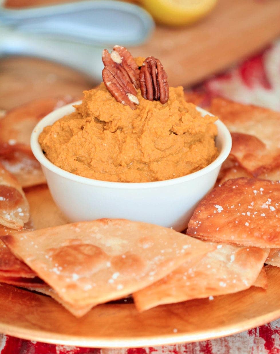 A close up of a plate of Hummus with Pumpkin