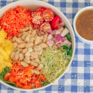 overhead shot of salad with vegetables in a white bowl