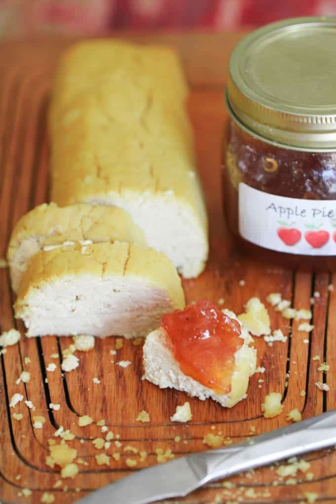 Tofu Chevre, a vegan goat cheese, on a wooden cutting board