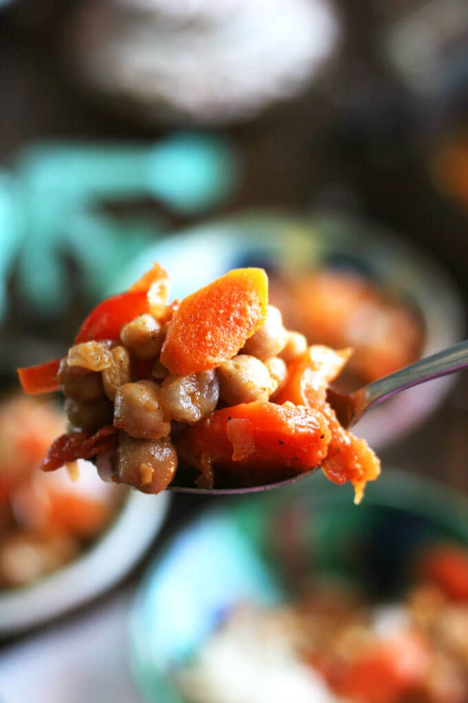 A close up of a spoonful of stew