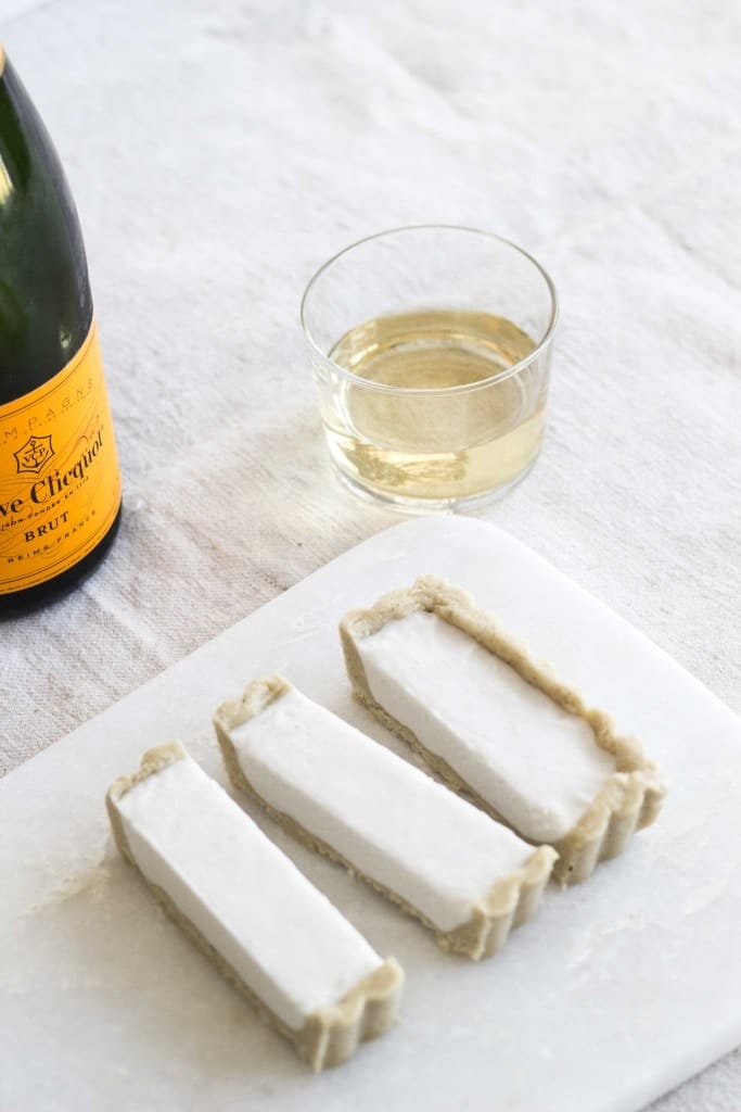 A plate of champagne tarts on a table