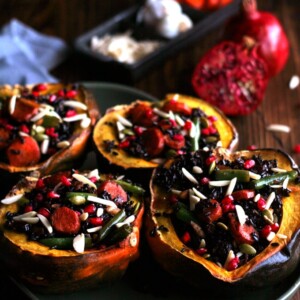 Acorn Squash on green plate on wooden table