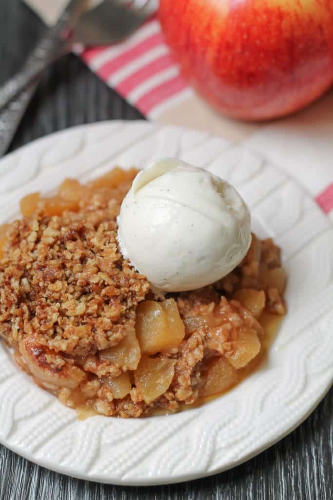 A close up of food i a bowl with Apple and vegan ice cream