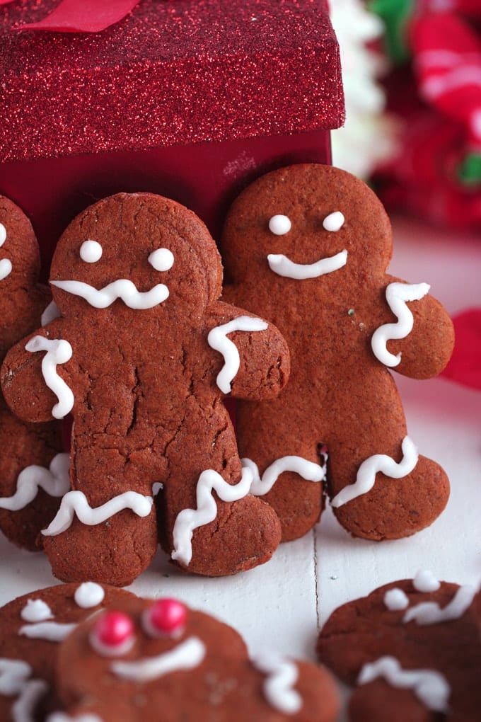 A close up of a three gingerbread men