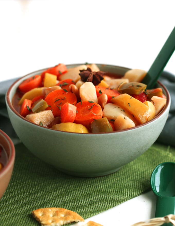 A bowl of vegetable soup on a table