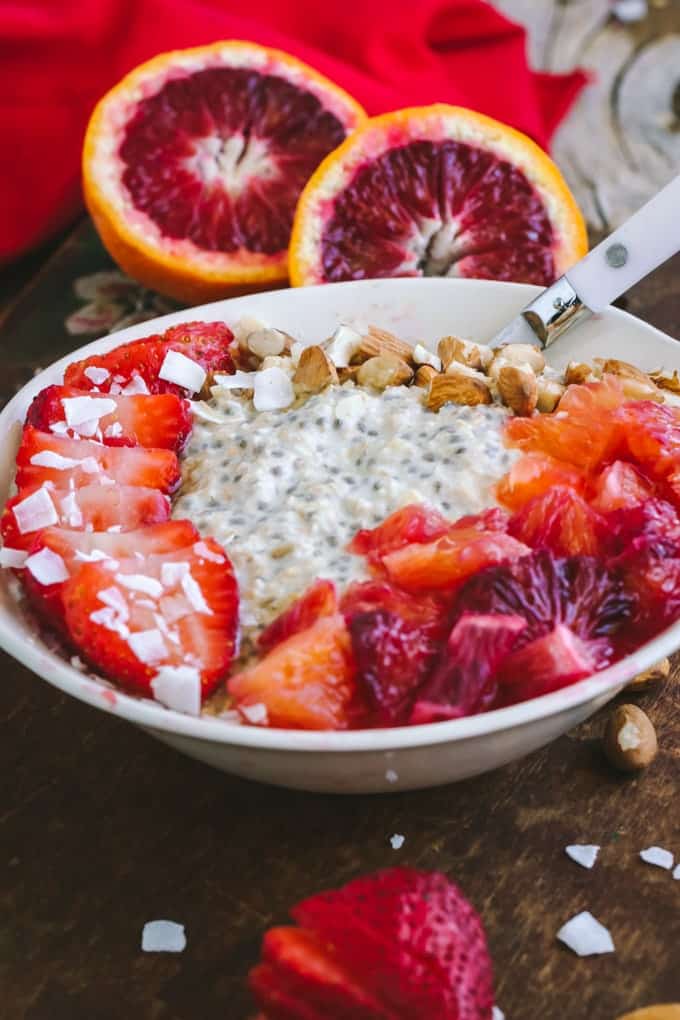 Closer front view of Blood Orange Overnight Oats in white bowl