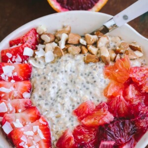 Overhead view of Blood Orange Overnight Oats in white bowl