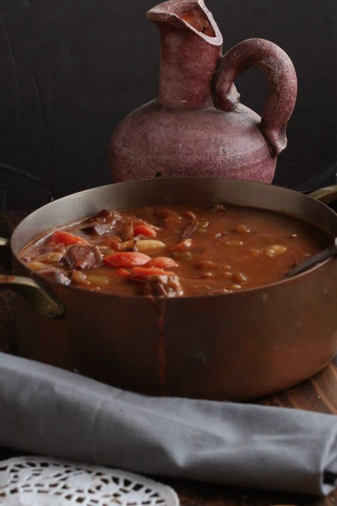 A pot with stew in it, with Guinness