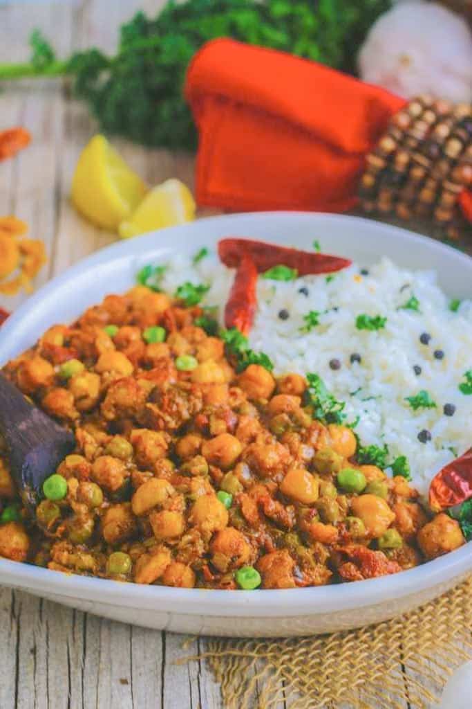 A side shot of bowl of  curry and rice