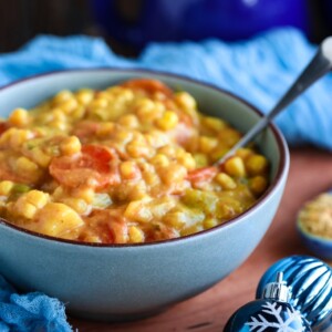 Vegan Corn Chowder in a light blue bowl on a table