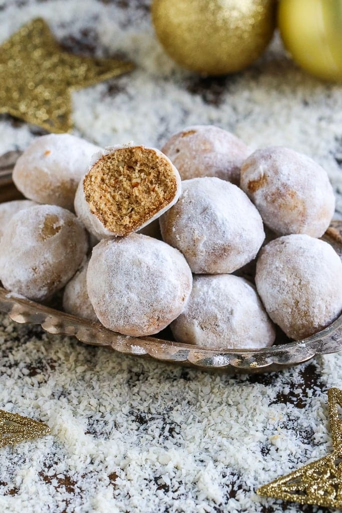 A close up of almond balls with Powdered sugar