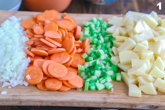 ingredients for vegan corn chowder on cutting board