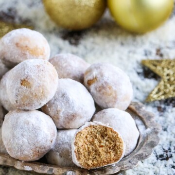 plate of vegan snowballs with a bite out of one