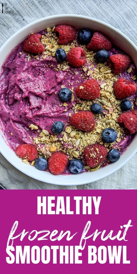 A bowl of fruit on a plate, with Smoothie and Berry