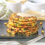 A tray of food on a table, with Fritter