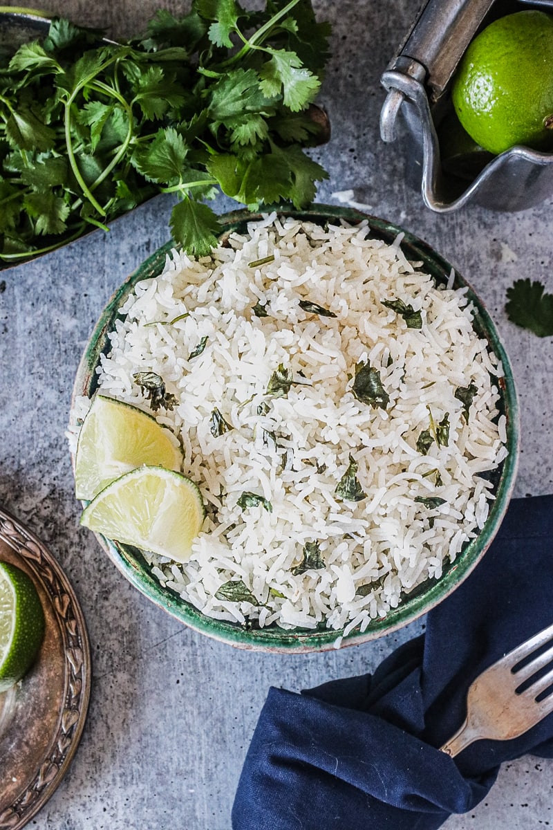 cilantro lime rice in a colorful bowl on a gray table
