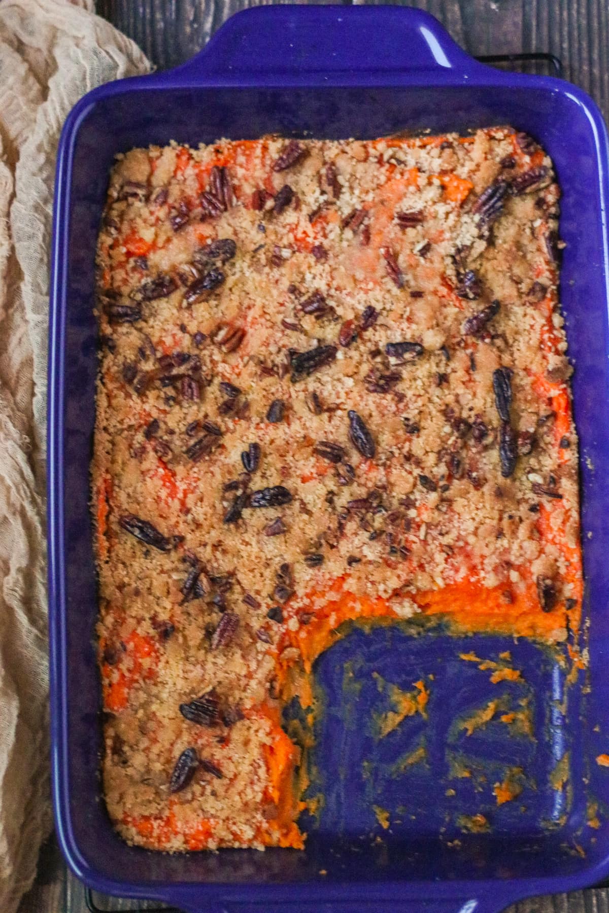 overhead view of vegan sweet potato casserole in a blue dish