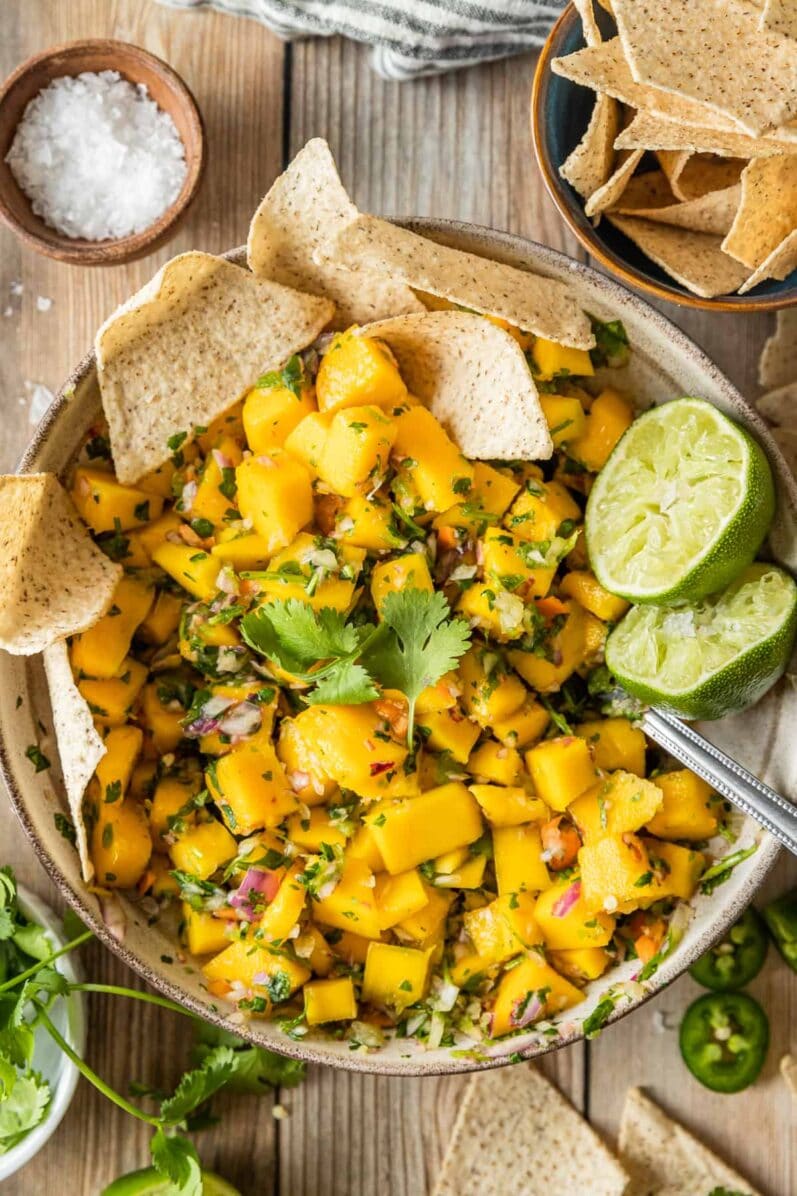 mango habenero salsa in a bowl on a wooden table