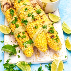 overhead view of grilled corn with Parmesan.