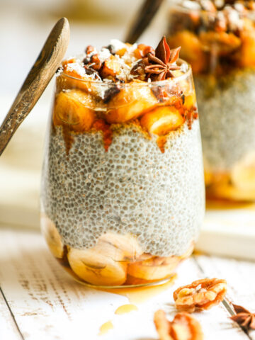 glass of overnight banana bread chia pudding on a white table