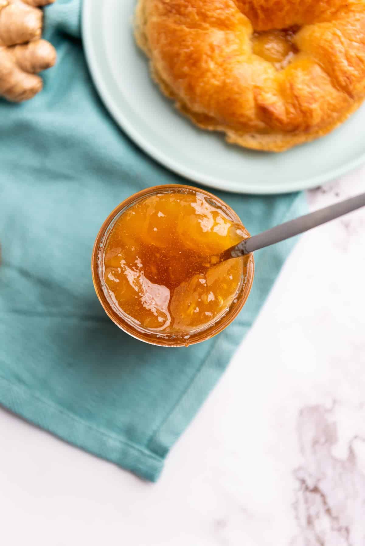 overhead view of jam on a mint green linen napkin