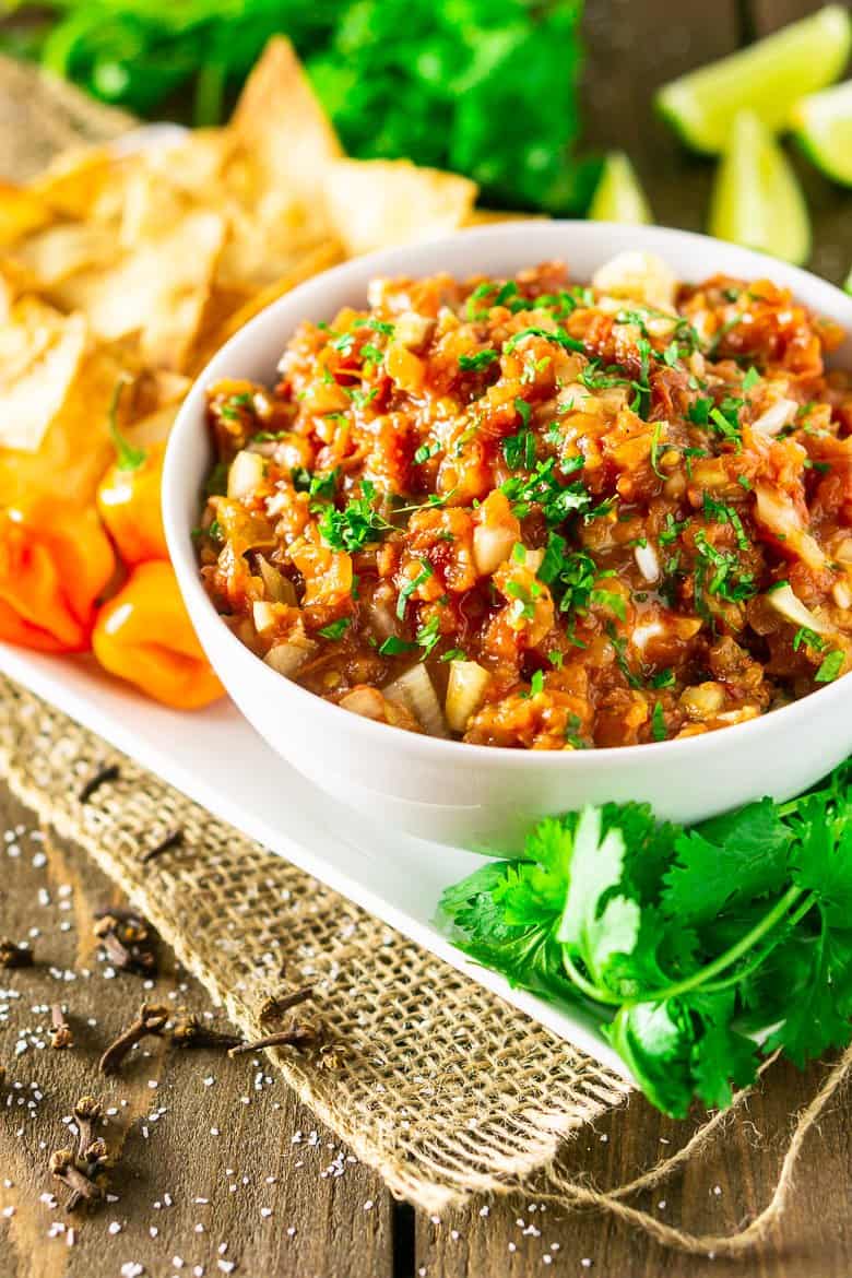 Jamaican jerk salsa in a white bowl on a wooden table