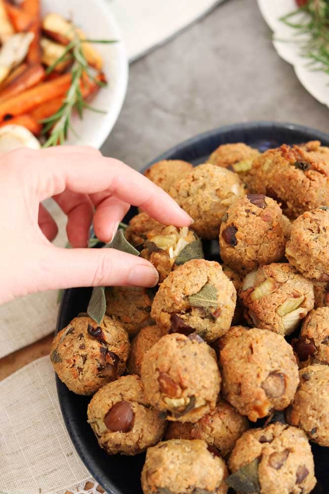 a bowl full of vegan sausage stuffing balls