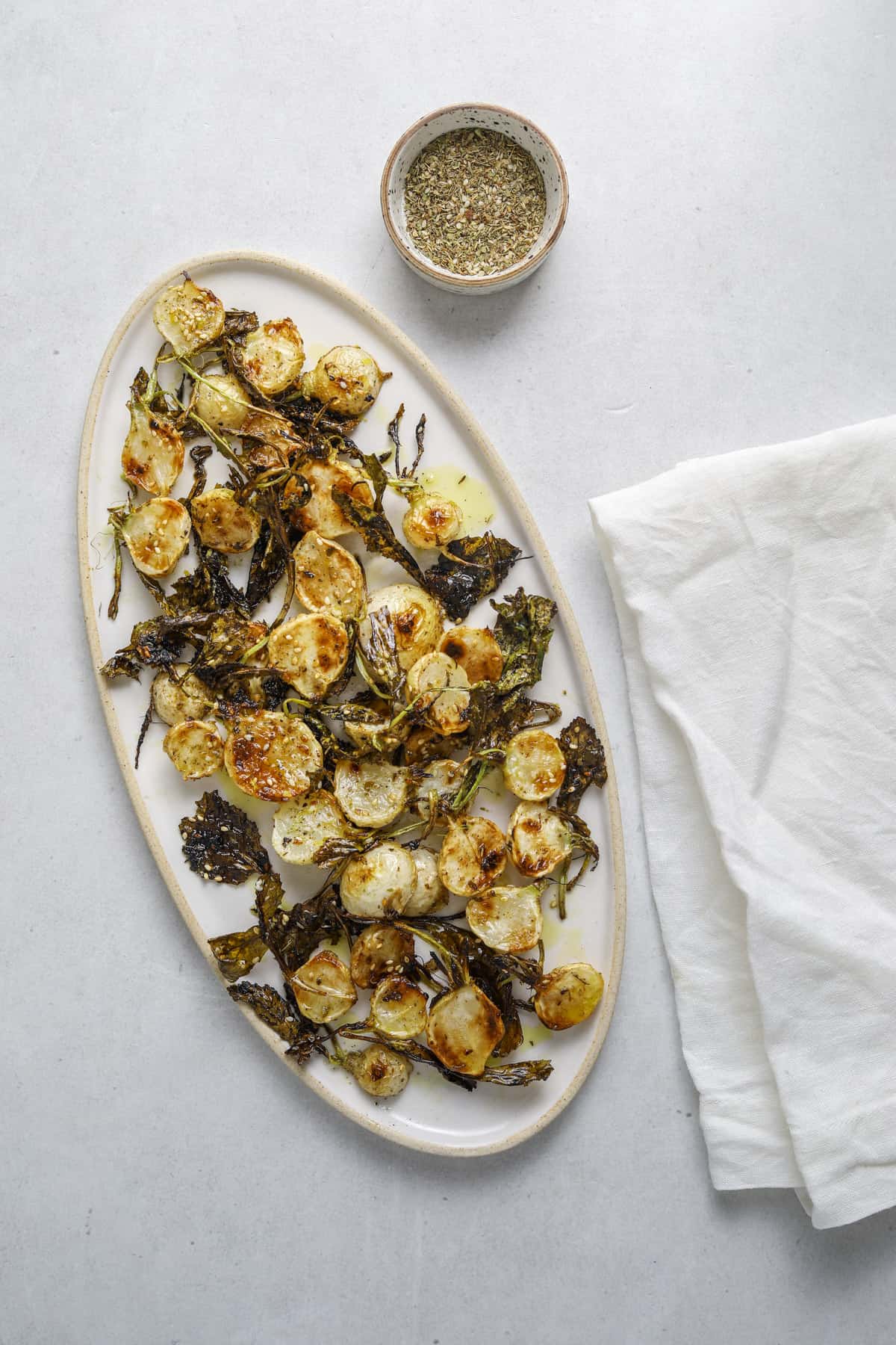 an oblong plate of roasted turnips