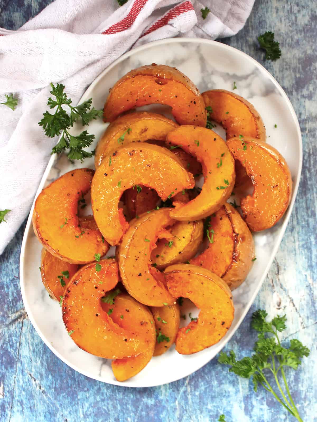 roasted butternut squash and pumpkin on a white plate