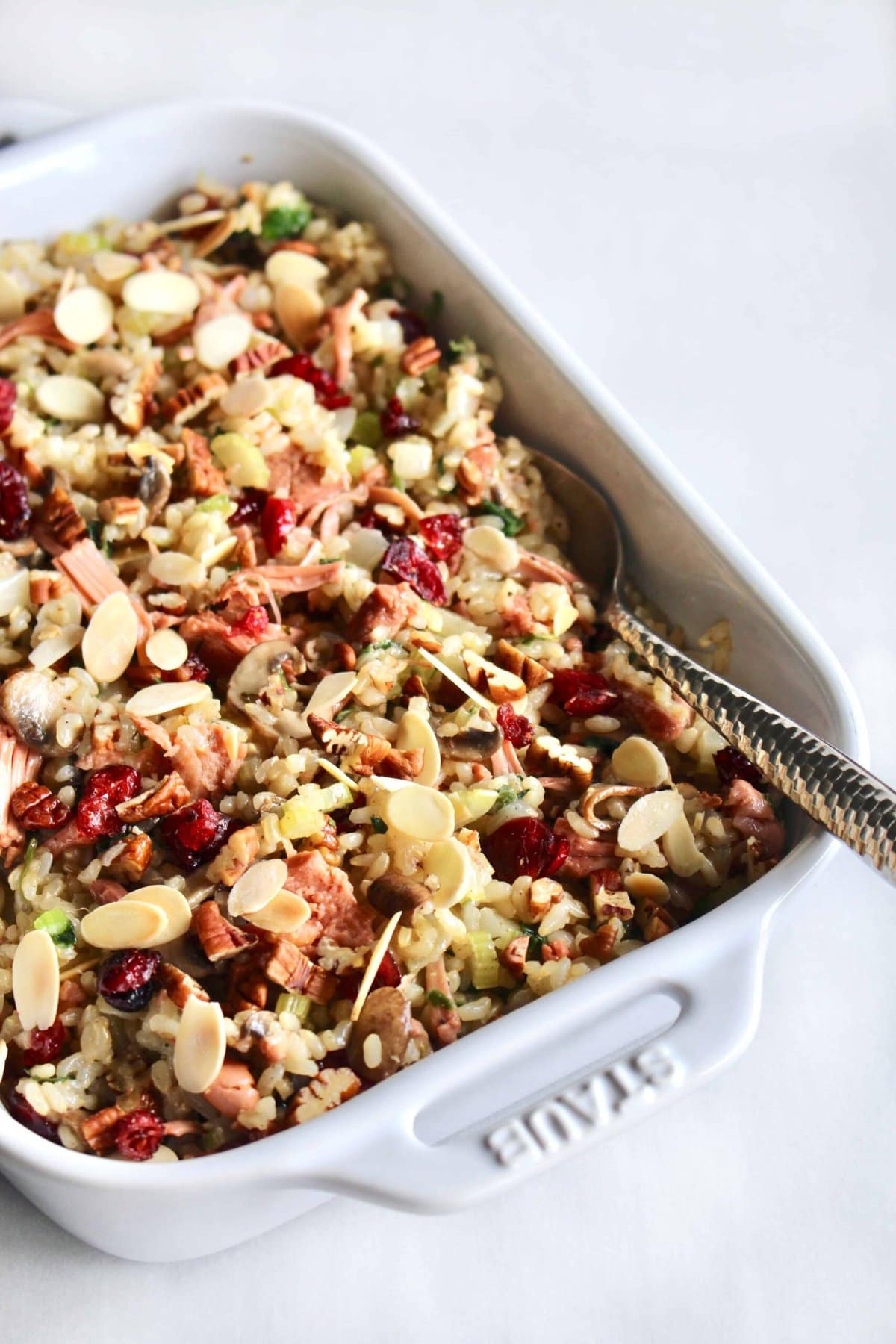 vegan rice stuffing in a white casserole dish