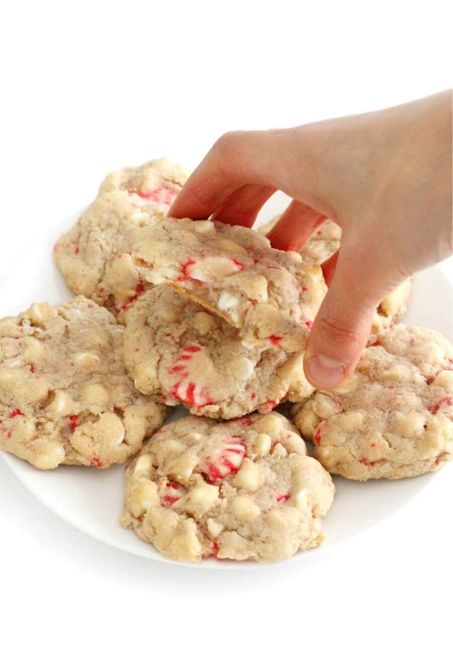 cookies with candy cane in them on a white plate