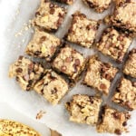 overhead view of oatmeal breakfast bars on white baking paper