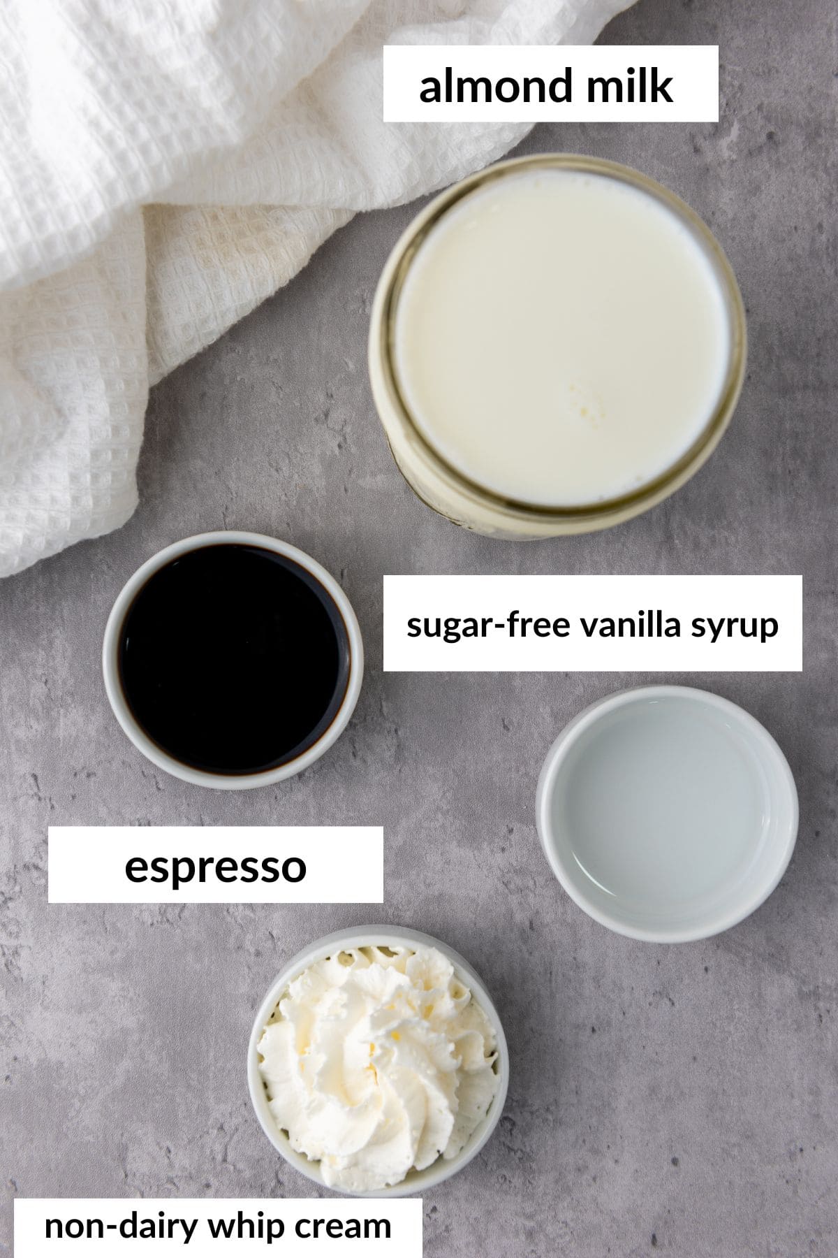 ingredients for skinny vanilla latte on a grey background