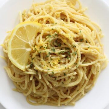 overhead view of pasta al limone on a white plate