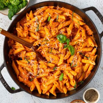 overhead view of a skillet full of vodka sauce pasta