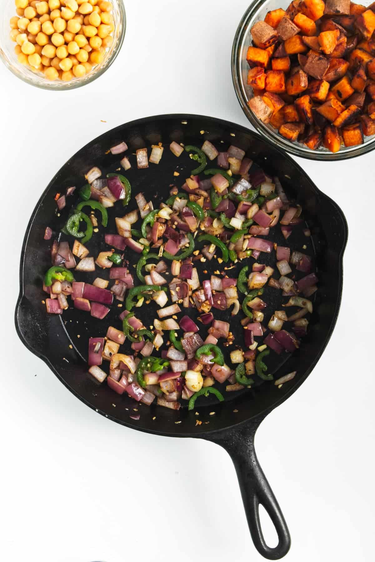 cooked vegetables in a black skillet