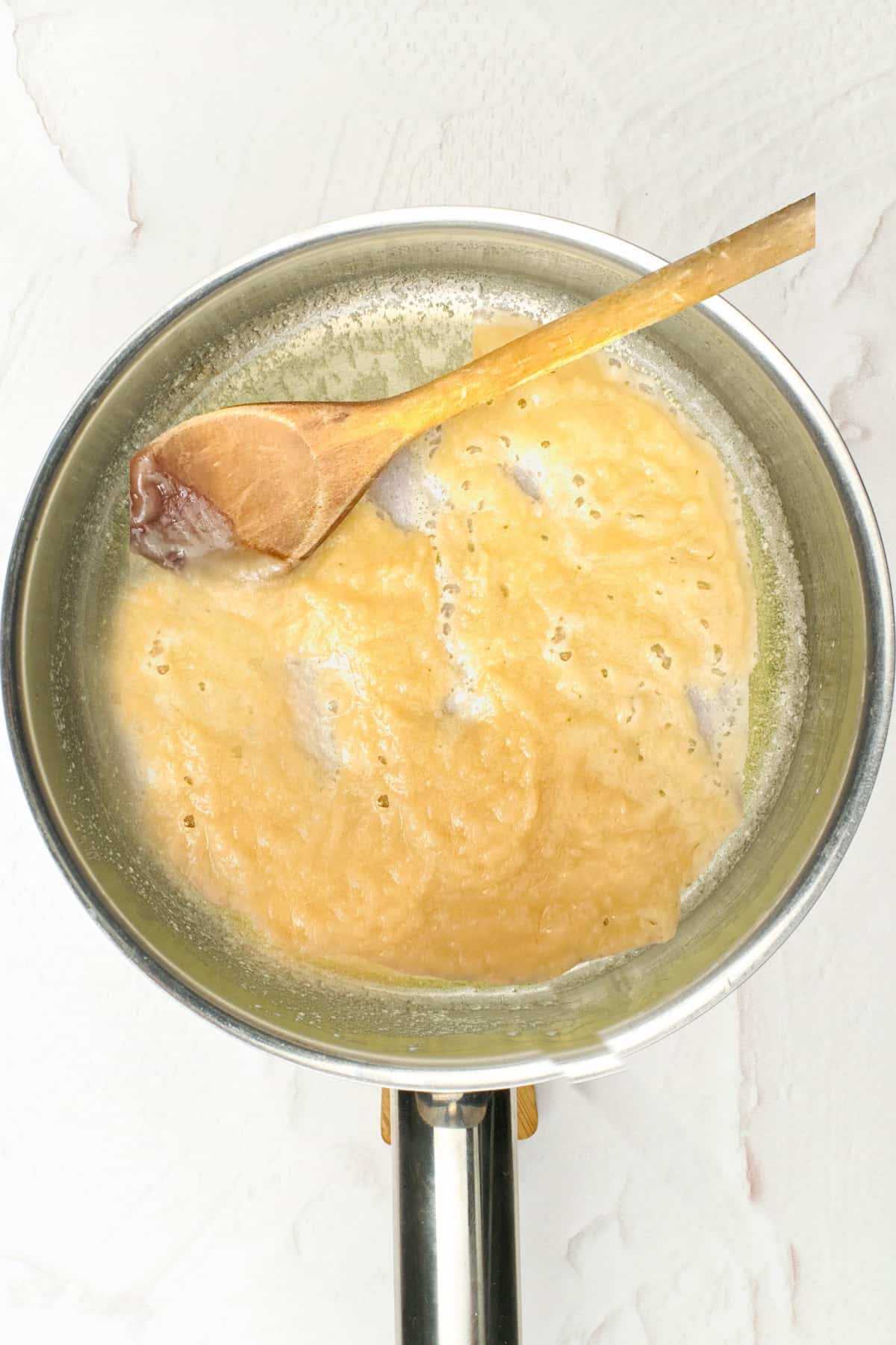 stir flour and butter together to make a white roux