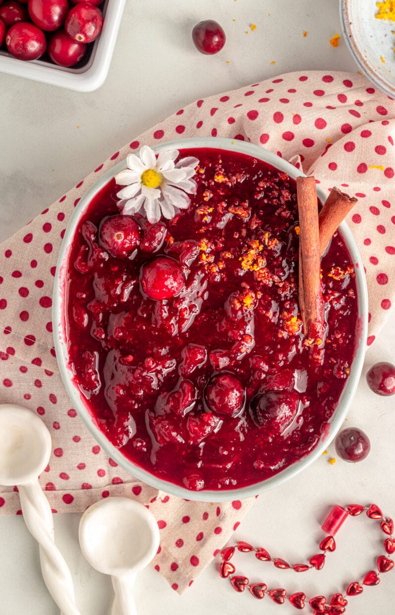 overhead view of vegan cranberry sauce on a marble table