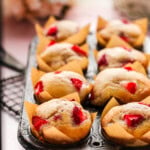 vegan strawberry muffins in a vintage muffin tin