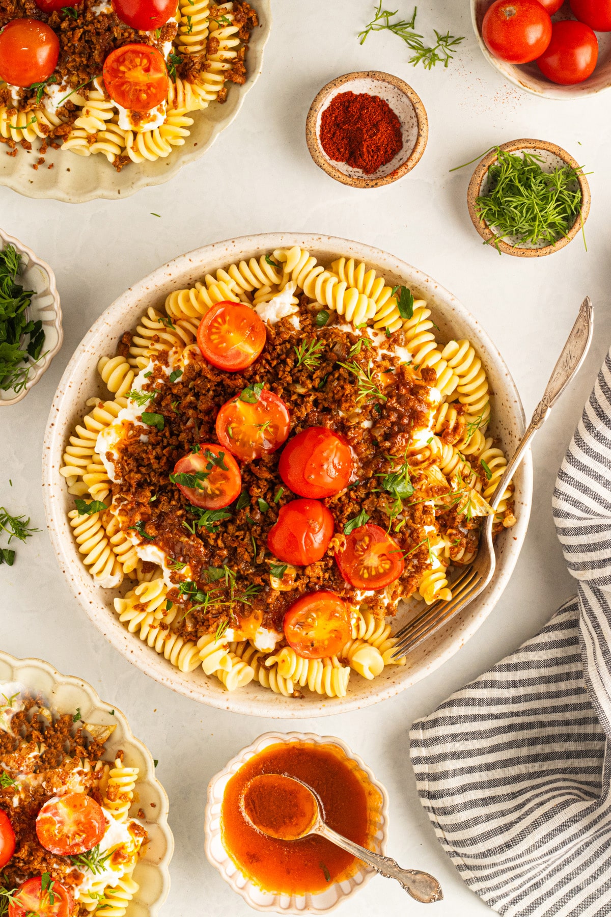 vegan Turkish pasta in a white bowl on a white table