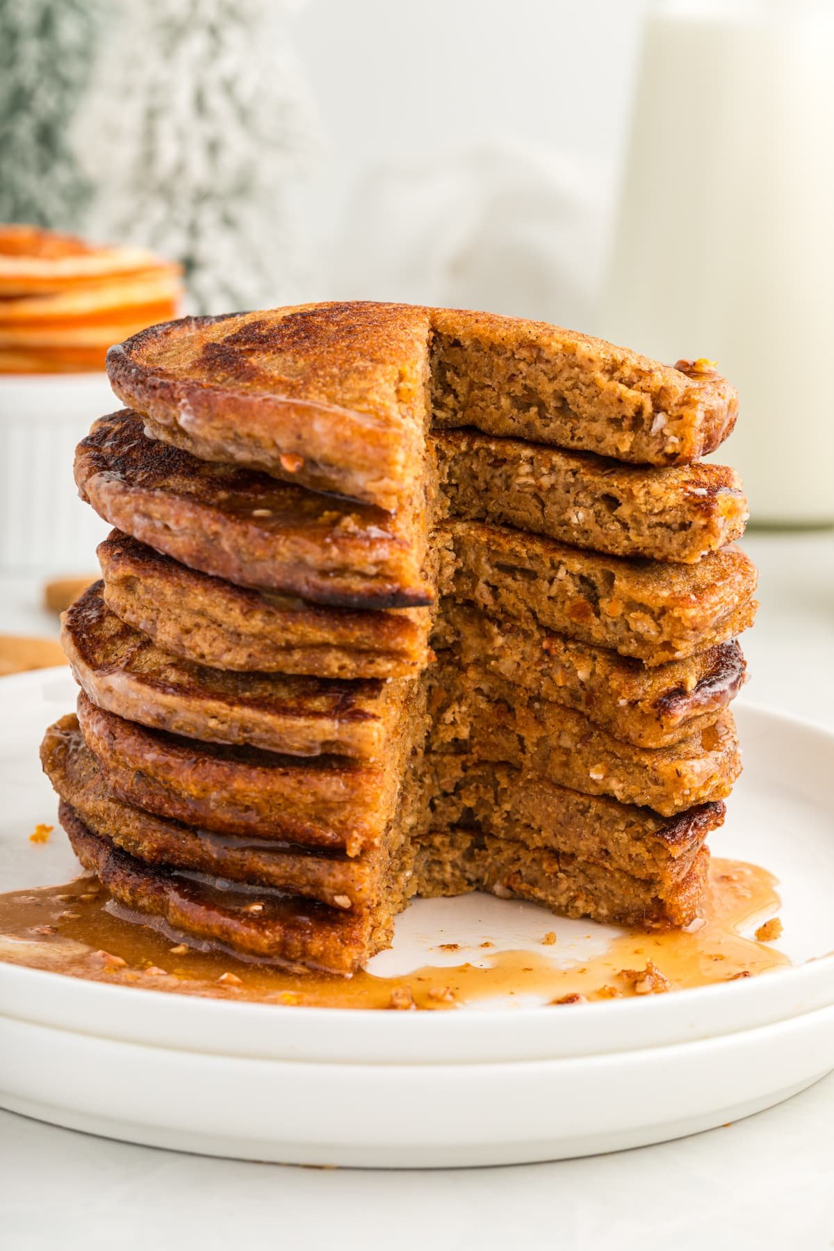stack of gingerbread pancakes with wedge cut out