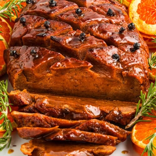 overhead closeup of vegan ham with slices out