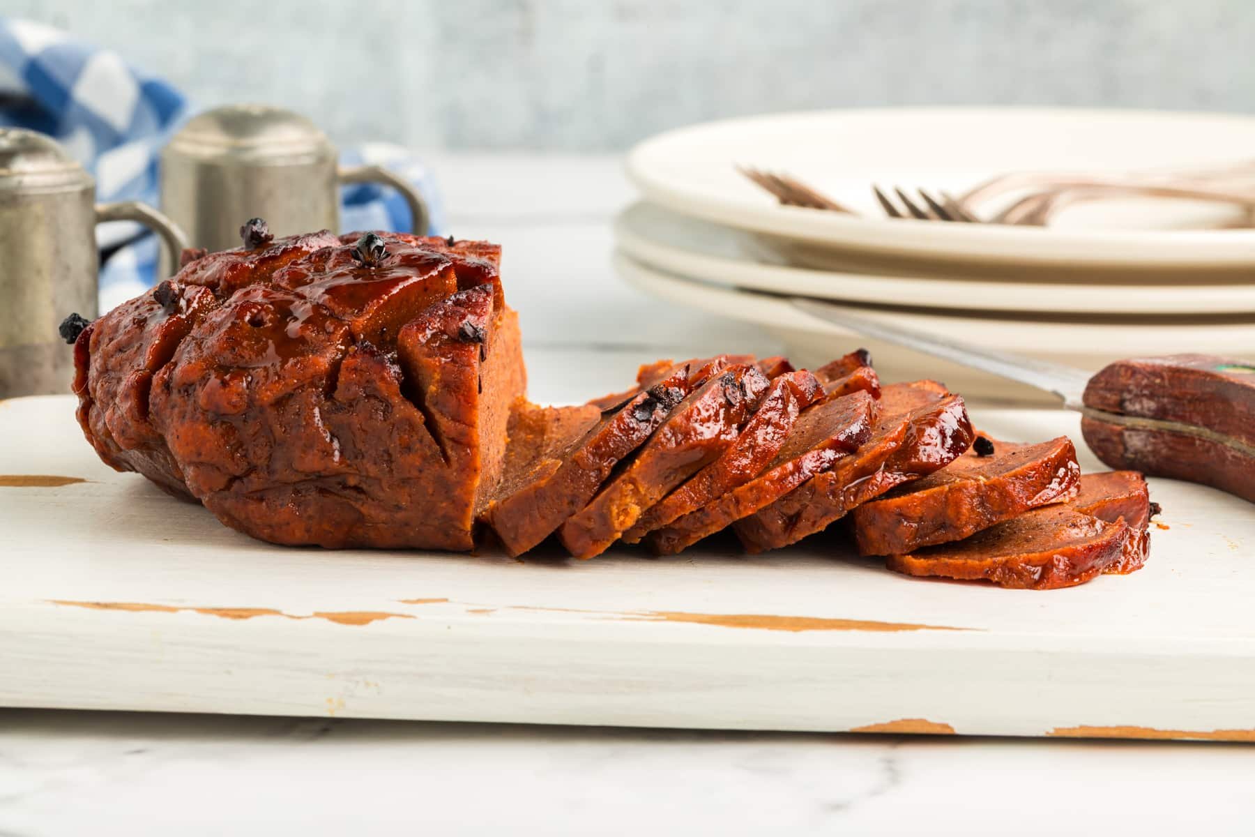 vertical image of sliced vegan ham