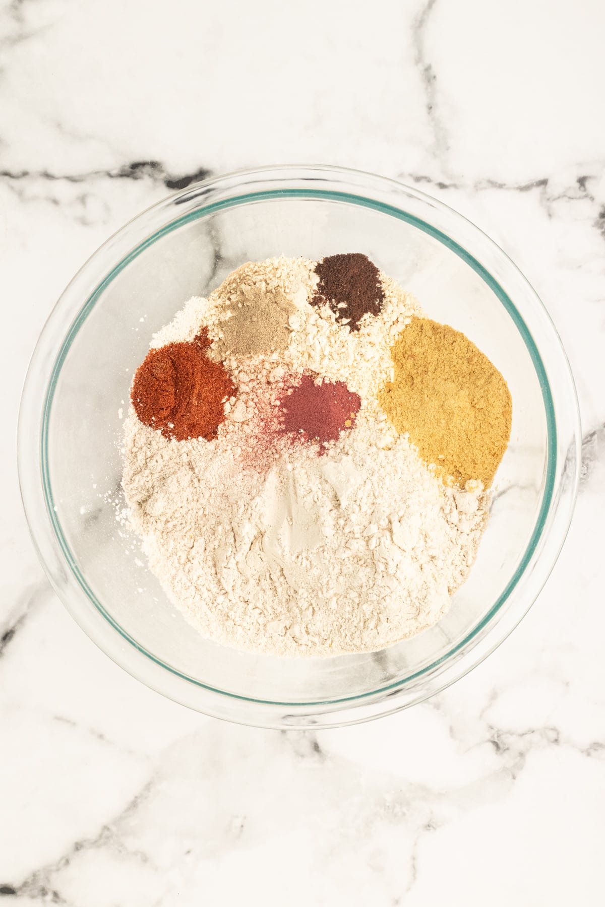 step 1 vegan ham adding dry ingredients to a bowl