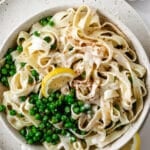 pasta and peas on a white plate