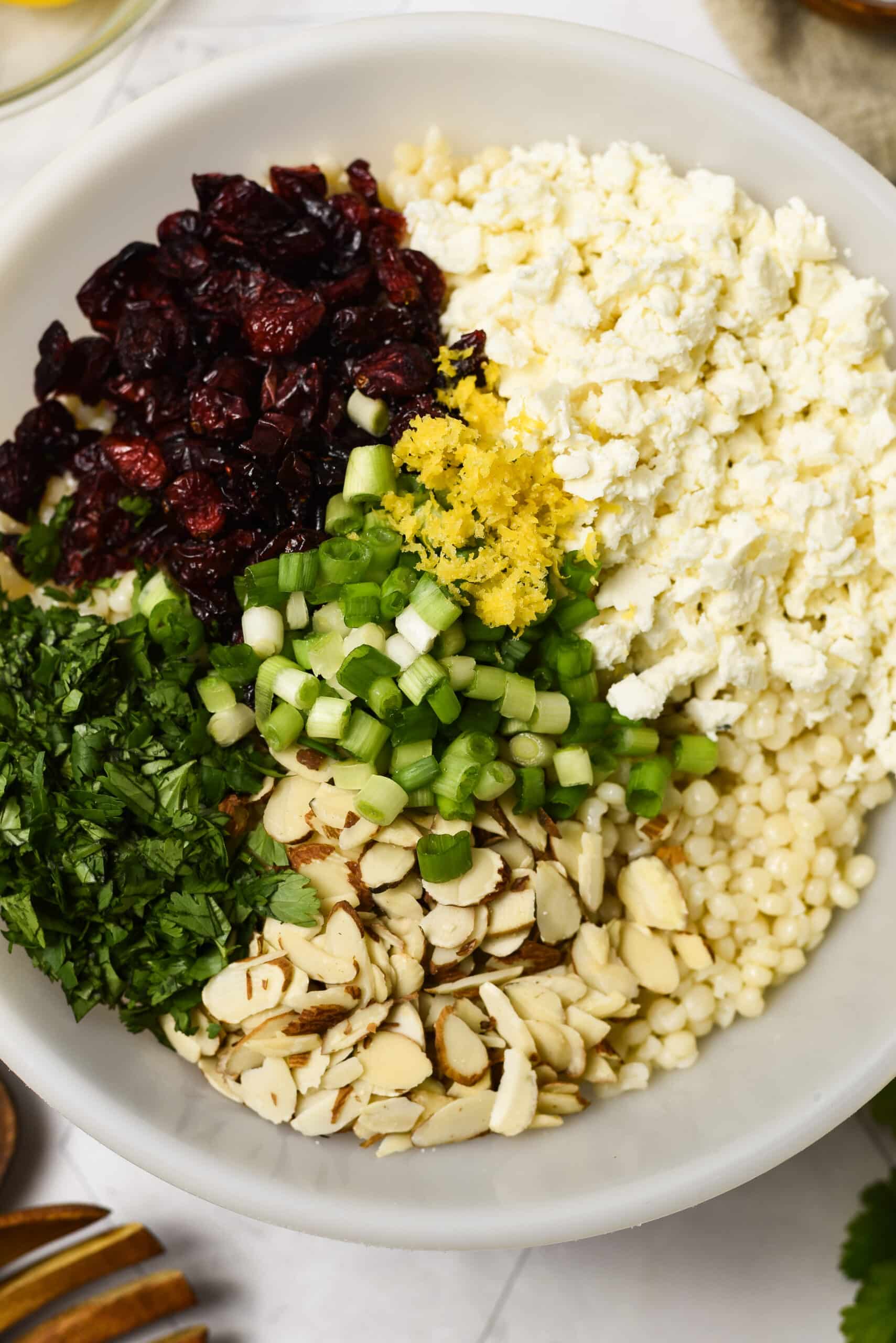Pearl Couscous Salad ingredients in a bowl